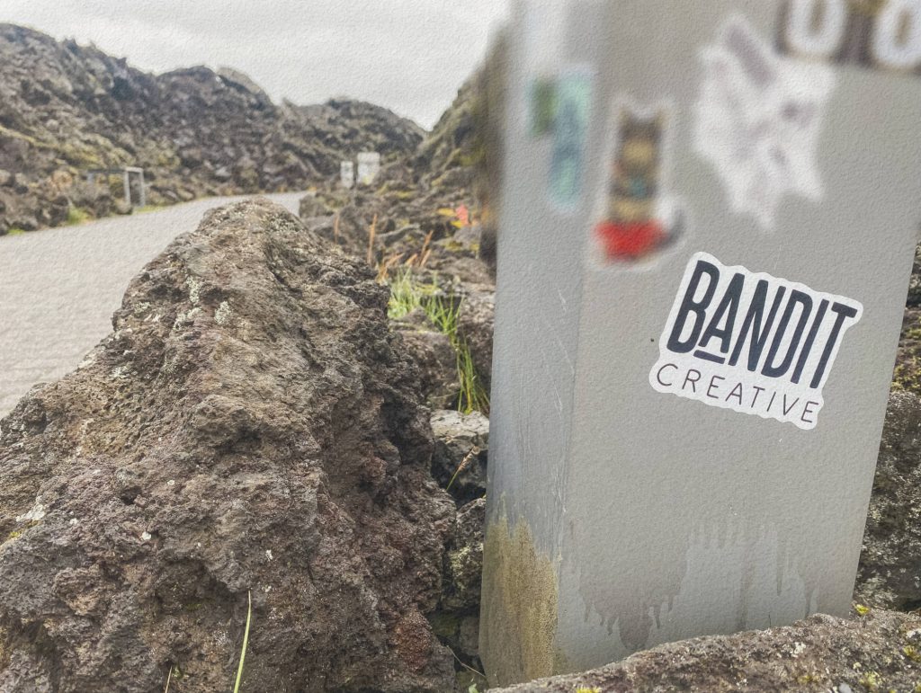 Bandit Creative sticker sitting on post at the Blue Lagoon iceland